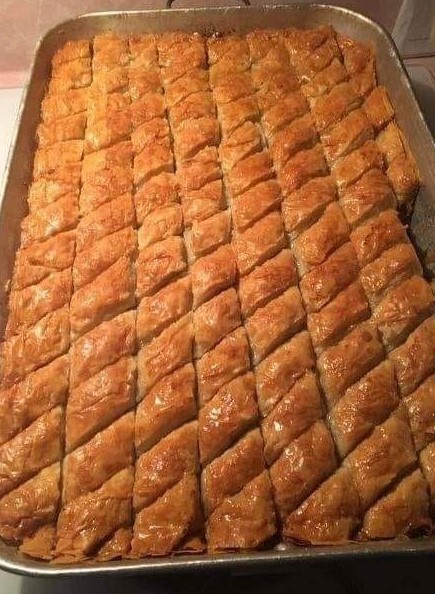 Delicious Baklava Recipe featuring golden layers of phyllo dough, nuts, and sweet syrup."

If you need an actual image generated, let me know, and I can assist with that!