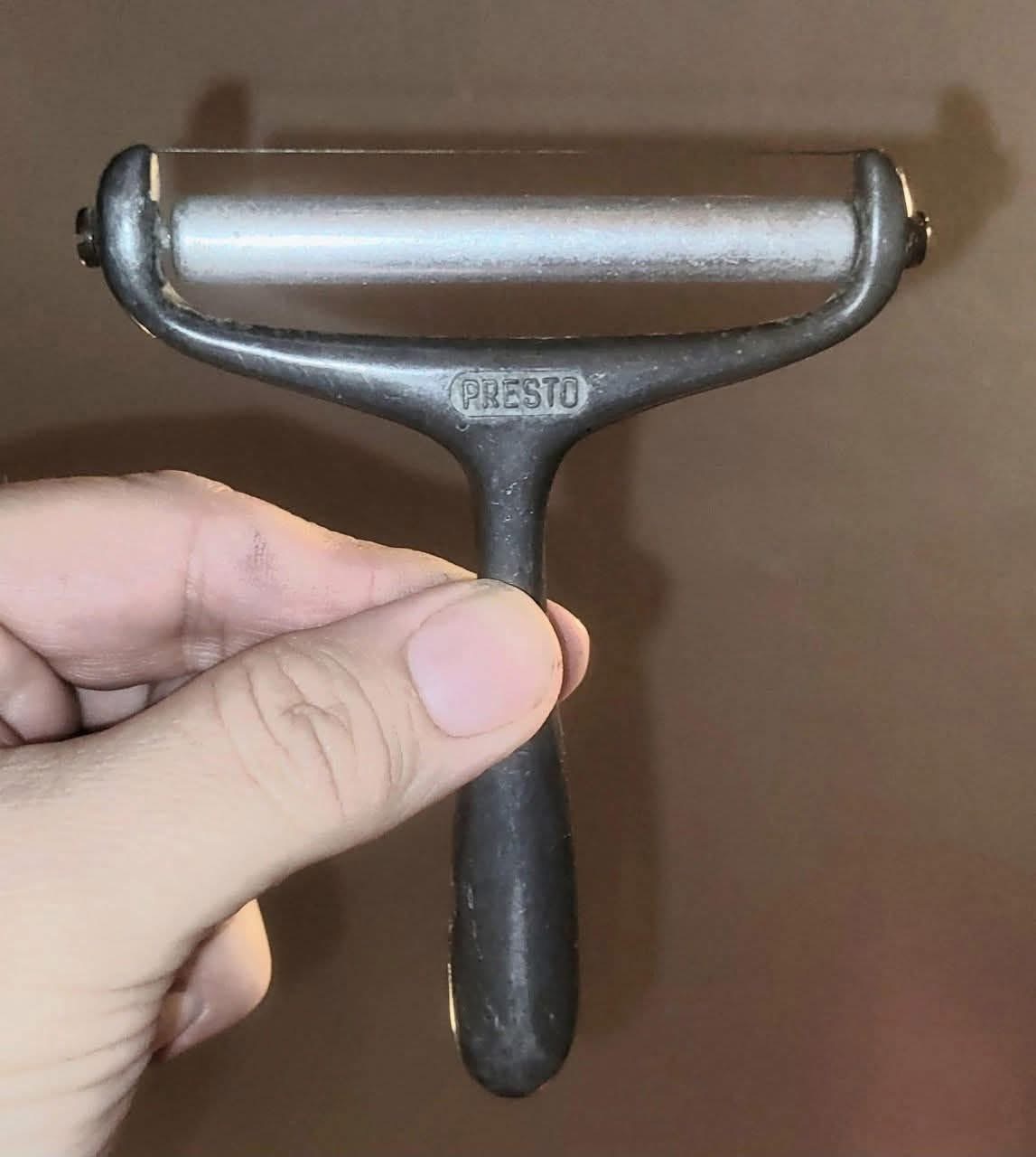 The Mystery and Charm of the Vintage Presto Aluminum Cheese Slicer