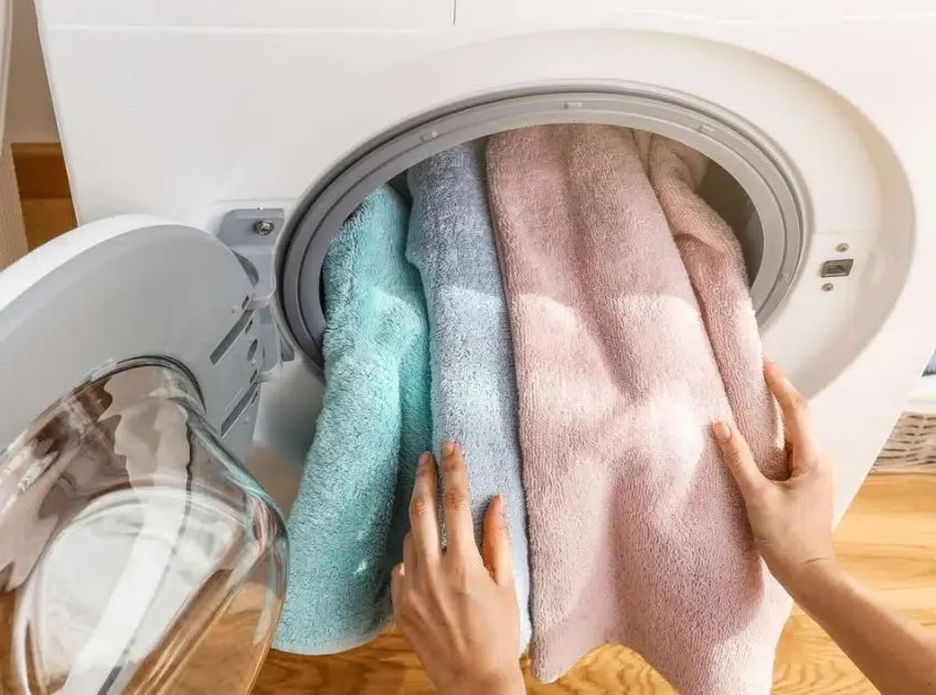 Why You Should Never Wash Towels With Your Clothing